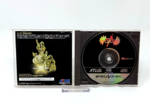 Interior del juego Sol Divide (JAP) para Sega Saturn con disco y manual