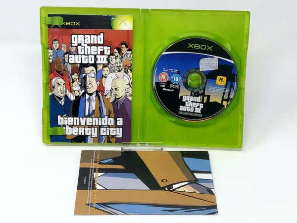 Interior del juego Grand Theft Auto III (Ed. Pack Doble de Rockstar Games) (ESP) (Con Mapa) para XBOX con disco y manual