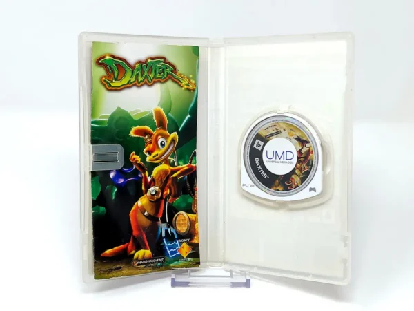 Interior del juego Daxter (ESP) (Platinum) para PSP con disco y manual