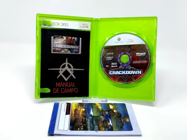 Interior del juego Crackdown (ESP) para XBOX 360 con disco y manual