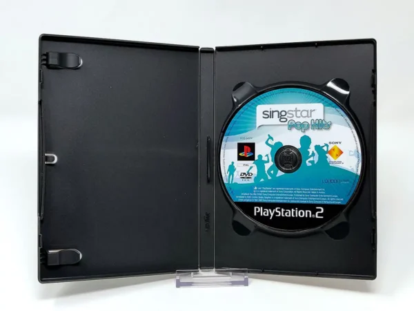 Interior del juego SingStar Pop Hits (FRA) (Rebajado) para PlayStation 2 con disco y manual