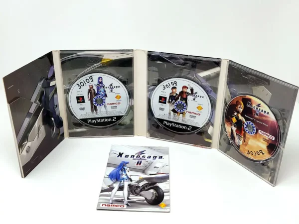 Lateral de la caja de Xenosaga Episode II: Jenseits von Gut und Böse (UK) (Rebajado) para PlayStation 2