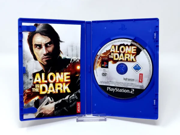 Interior del juego Alone in the Dark (FRA) para PlayStation 2 con disco y manual