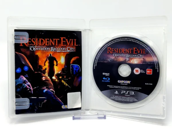 Interior del juego Resident Evil: Operation Raccoon City (ESP) para PlayStation 3 con disco y manual