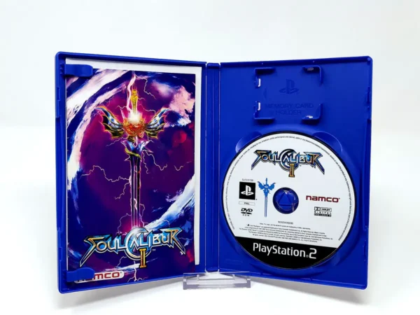 Interior del juego Soulcalibur II (UK) para PlayStation 2 con disco y manual