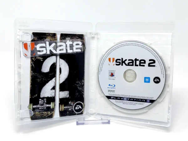 Interior del juego Skate 2 (UK) para PlayStation 3 con disco y manual