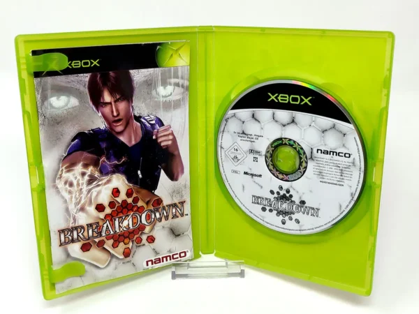 Interior del juego Breakdown (ALE) para XBOX con disco y manual
