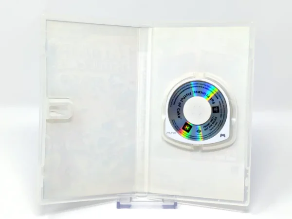 Interior del juego Fat Princess: Fistful of Cake (ESP) (Promo) para PSP con disco y manual