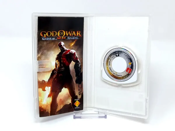 Interior del juego God of War: Ghost of Sparta (ESP) (Essentials) para PSP con disco y manual