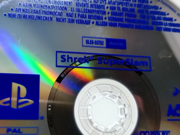 Interior del juego DreamWorks Shrek: SuperSlam (ESP) (Promo) para PlayStation 2 con disco y manual