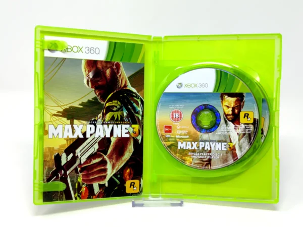 Interior del juego Max Payne 3 (ESP) para XBOX 360 con disco y manual