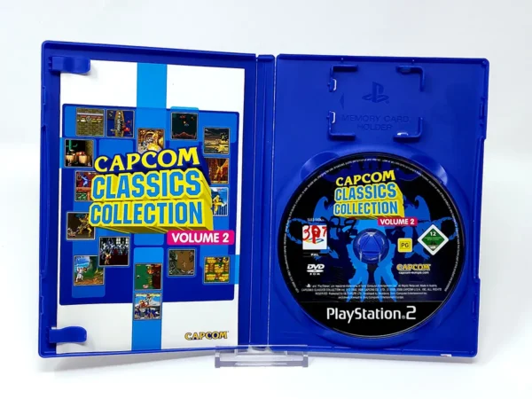 Interior del juego Capcom Classics Collection Vol. 2 (ESP) para PlayStation 2 con disco y manual