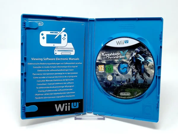 Interior del juego Xenoblade Chronicles X (ESP) para Nintendo Wii U con disco y manual