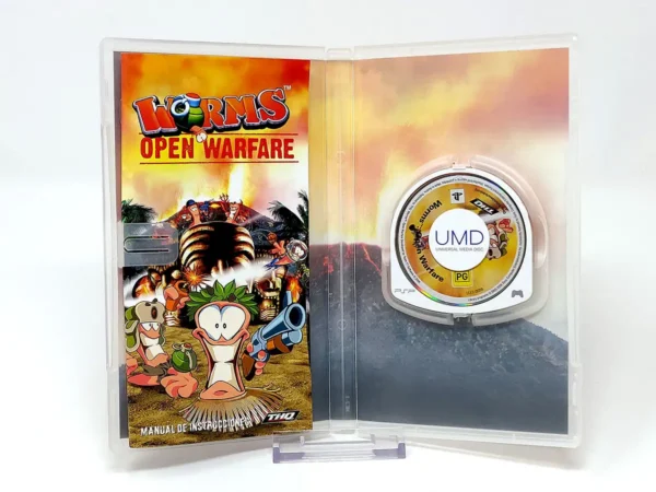Interior del juego Worms: Open Warfare (ESP) para PSP con disco y manual