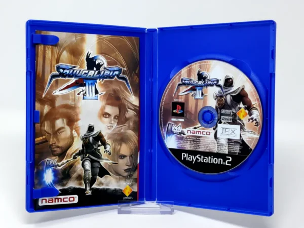 Interior del juego Soulcalibur III (ESP) para PlayStation 2 con disco y manual