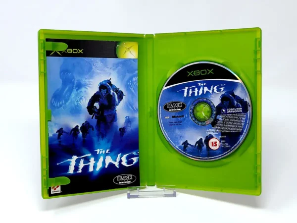 Interior del juego The Thing (UK) para XBOX con disco y manual