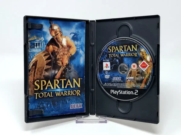 Interior del juego Spartan: Total Warrior (ITA) para PlayStation 2 con disco y manual