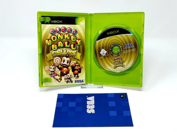 Interior del juego Super Monkey Ball Deluxe (ESP) para XBOX con disco y manual