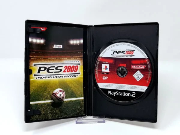 Interior del juego PES 2009: Pro Evolution Soccer (FRA) para PlayStation 2 con disco y manual