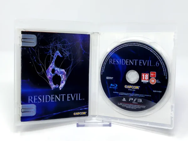 Interior del juego Resident Evil 6 (UK) para PlayStation 3 con disco y manual