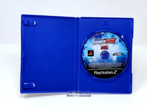 Interior del juego WWE SmackDown vs. Raw 2008 (FRA) (Rebajado) para PlayStation 2 con disco y manual