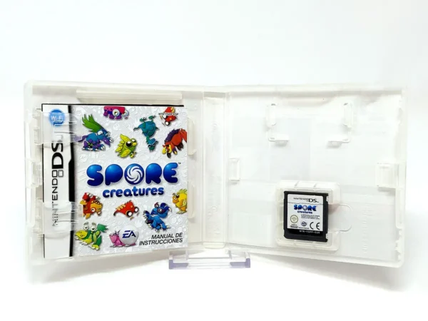 Interior del juego Spore: La Batalla de los Héroes (ESP) para Nintendo DS con disco y manual