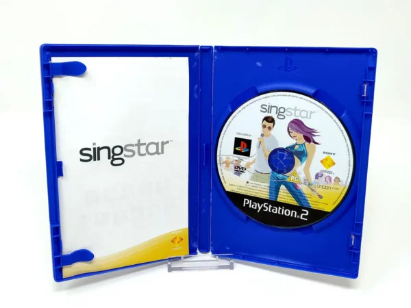 Interior del juego SingStar (UK) para PlayStation 2 con disco y manual