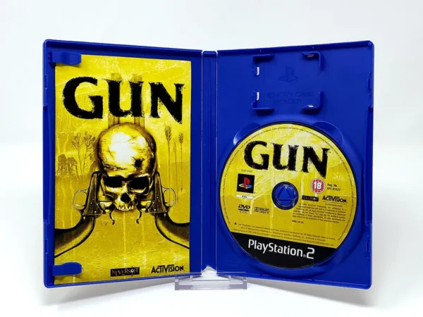 Interior del juego Gun (ITA) para PlayStation 2 con disco y manual