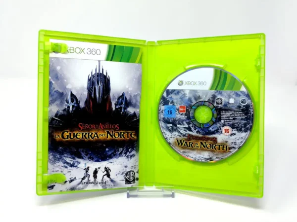 Interior del juego El Señor de los Anillos: La Guerra del Norte (ESP) para XBOX 360 con disco y manual