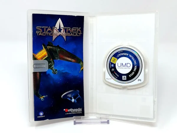 Interior del juego Star Trek: Tactical Assault (ESP) para PSP con disco y manual