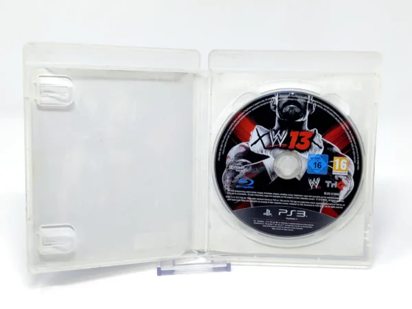 Interior del juego WWE '13 (ESP) (v2) (Rebajado) para PlayStation 3 con disco y manual