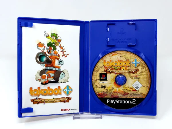Interior del juego Tokobot Plus: Mysteries of the Karakuri (ESP) para PlayStation 2 con disco y manual