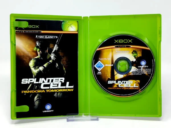 Interior del juego Tom Clancy's Splinter Cell: Pandora Tomorrow (FRA) para XBOX con disco y manual