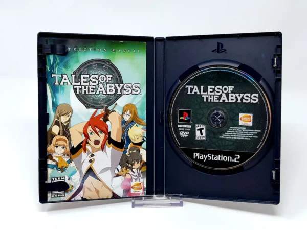 Interior del juego Tales of the Abyss (USA) para PlayStation 2 con disco y manual