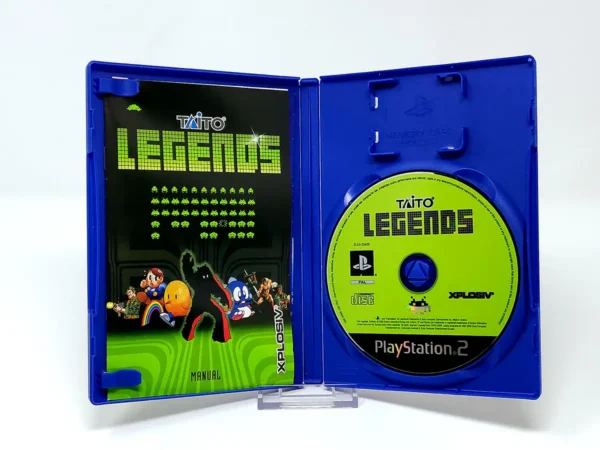 Interior del juego Taito Legends (ESP) para PlayStation 2 con disco y manual