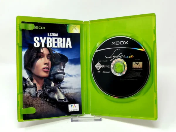 Interior del juego Syberia (ESP) para XBOX con disco y manual