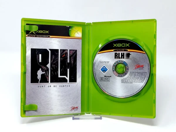 Interior del juego RLH: Run Like Hell (ESP) para XBOX con disco y manual