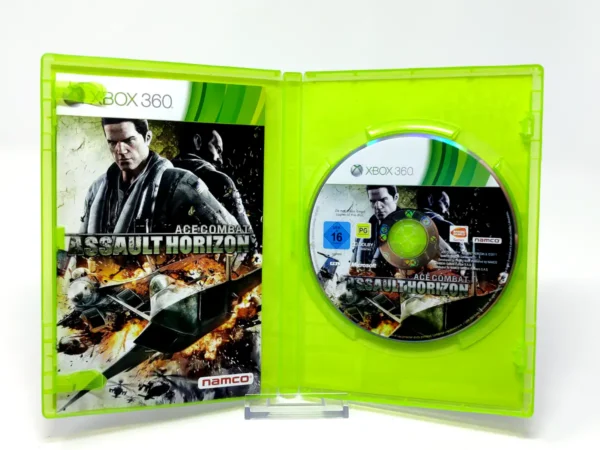 Interior del juego Ace Combat: Assault Horizon (ESP) para XBOX 360 con disco y manual