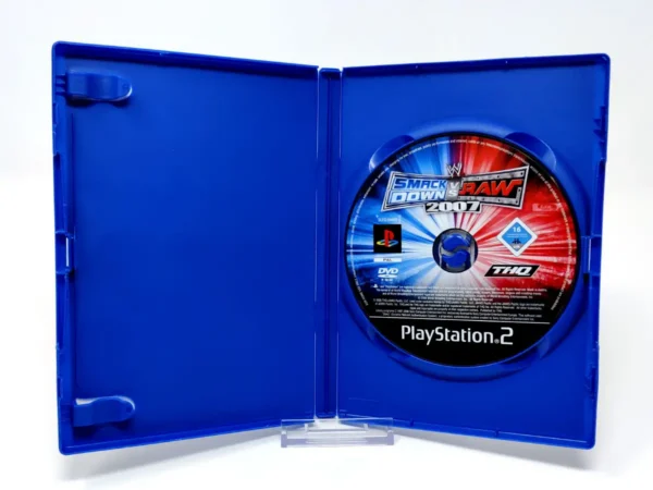Interior del juego WWE SmackDown vs. Raw 2007 (ESP) (Rebajado) para PlayStation 2 con disco y manual