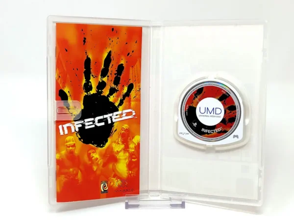 Interior del juego Infected (ESP) para PSP con disco y manual