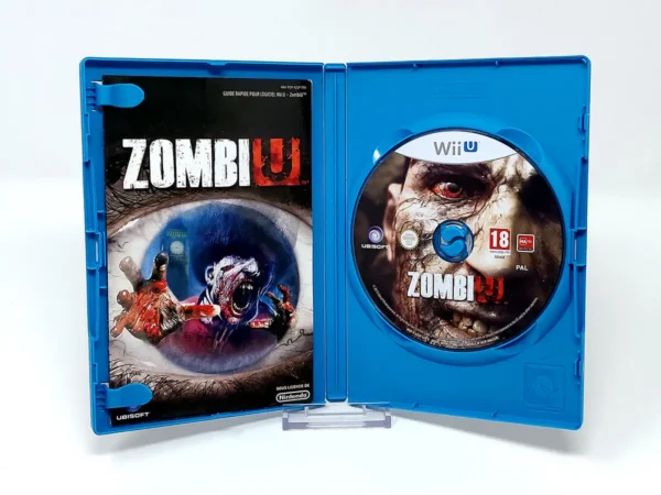 Interior del juego ZombiU (FRA) para Nintendo Wii U con disco y manual