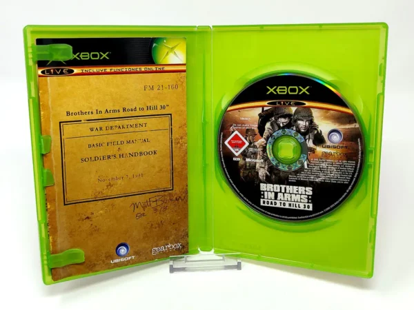 Interior del juego Brothers in Arms: Road to Hill 30 (ESP) para XBOX con disco y manual
