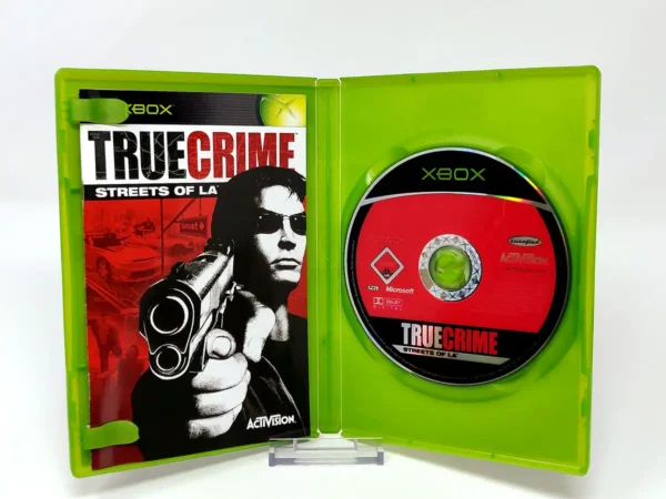 Interior del juego True Crime: Streets of LA (ESP) para XBOX con disco y manual