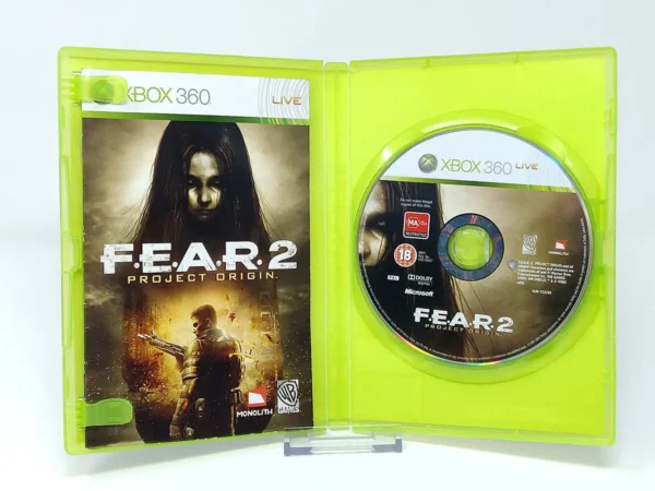 Interior del juego F.E.A.R. 2: Project Origin (UK) para XBOX 360 con disco y manual
