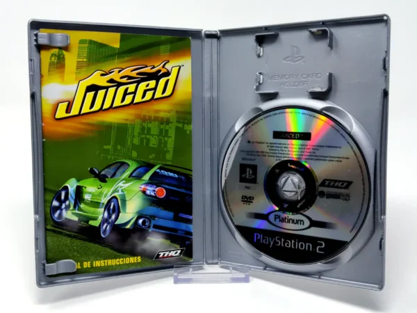 Interior del juego Juiced (ESP) (Platinum) para PlayStation 2 con disco y manual