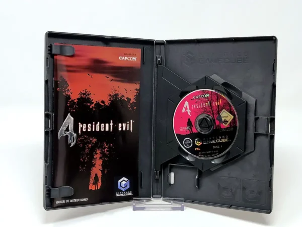 Interior del juego Resident Evil 4 (ESP) para Nintendo GameCube con disco y manual
