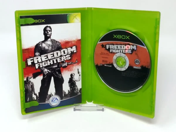 Interior del juego Freedom Fighters (ESP) para XBOX con disco y manual