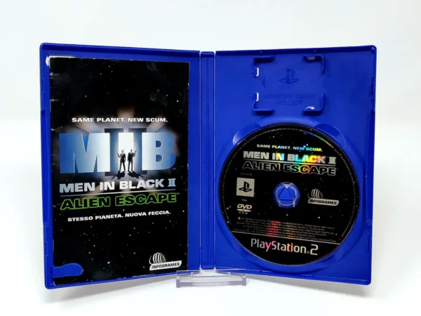 Interior del juego Men in Black II: Alien Escape (ESP) para PlayStation 2 con disco y manual