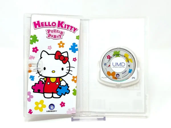 Interior del juego Hello Kitty: Puzzle Party (ESP) (Essentials) para PSP con disco y manual