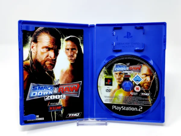 Interior del juego WWE SmackDown vs. Raw 2009 (ESP) para PlayStation 2 con disco y manual